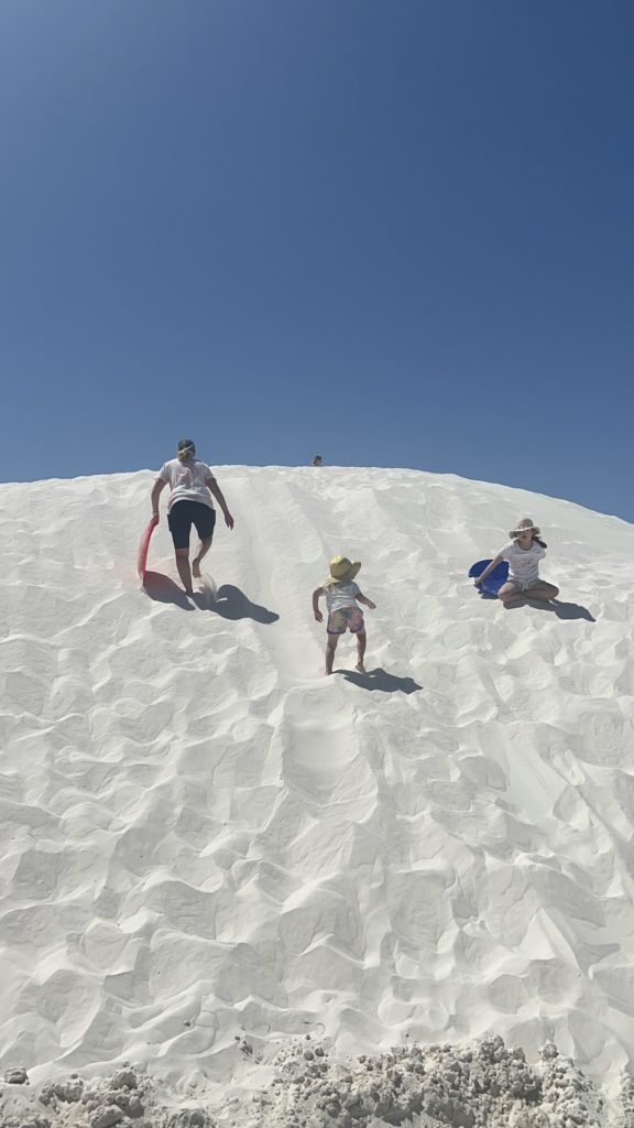 Sledding at White Sands National Park